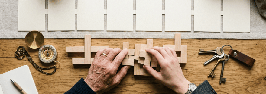 Overhead succession planning workspace with hands